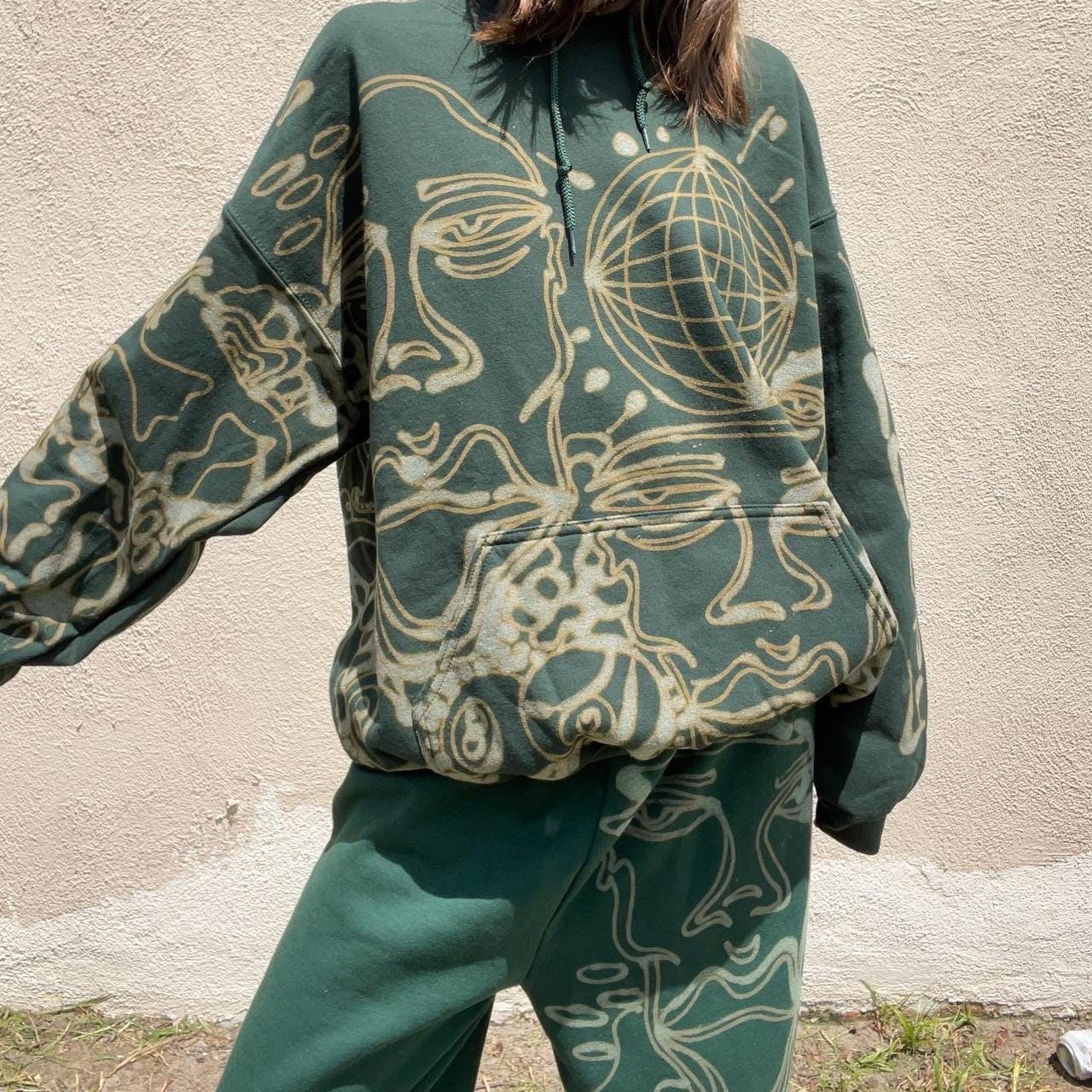 Custom graphic faces and mountains sweatpants and hoodie matching set