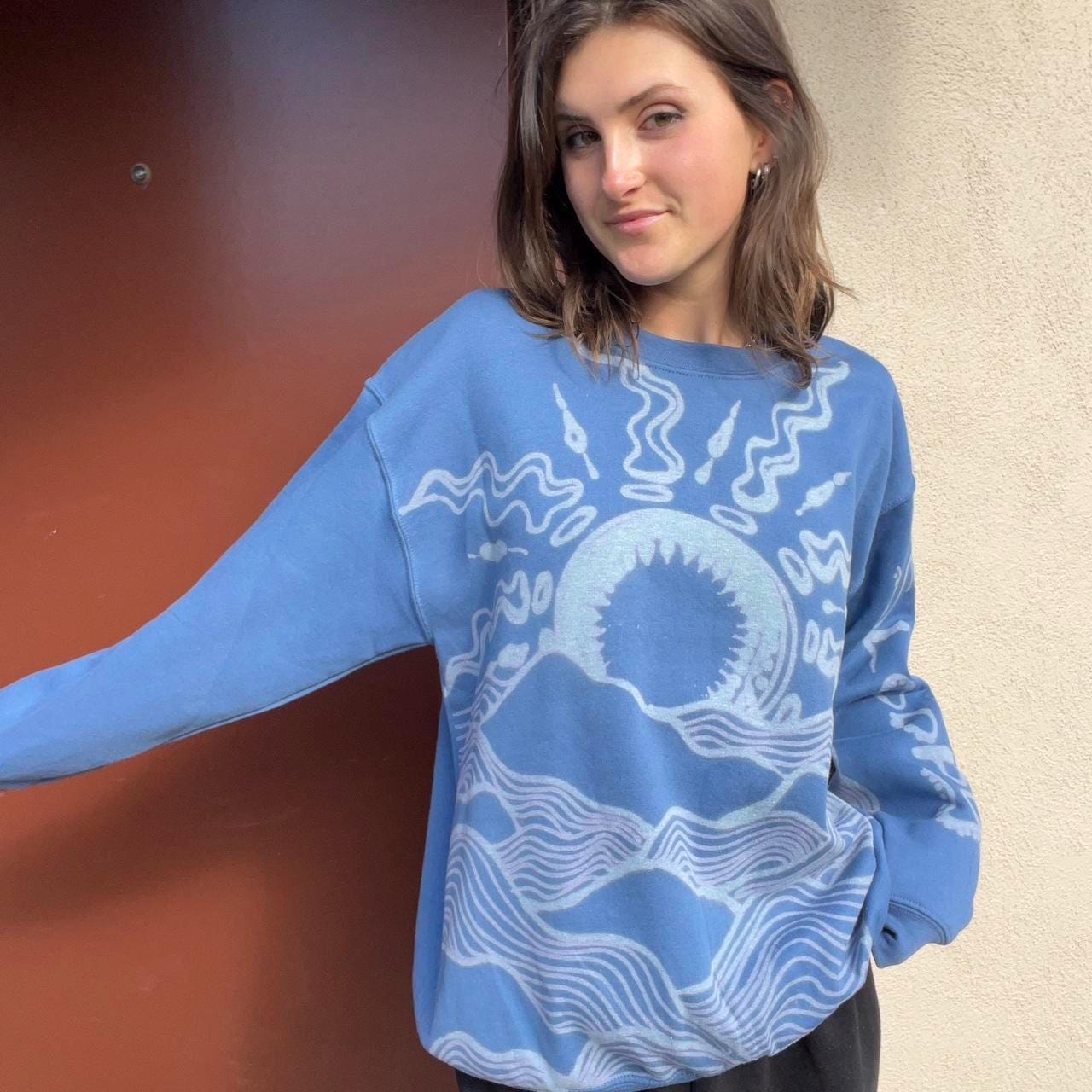 Psychedelic waves and sunset crewneck