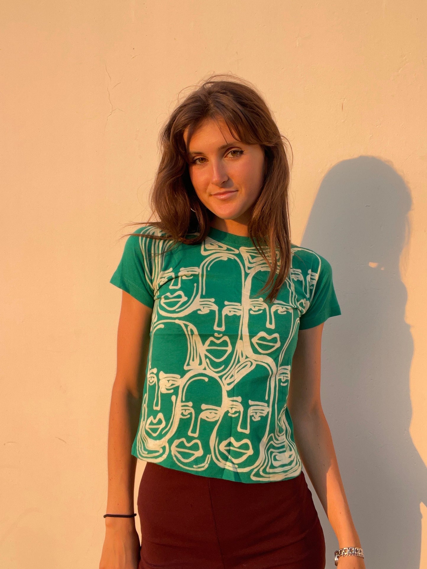 Various faces baby tees
