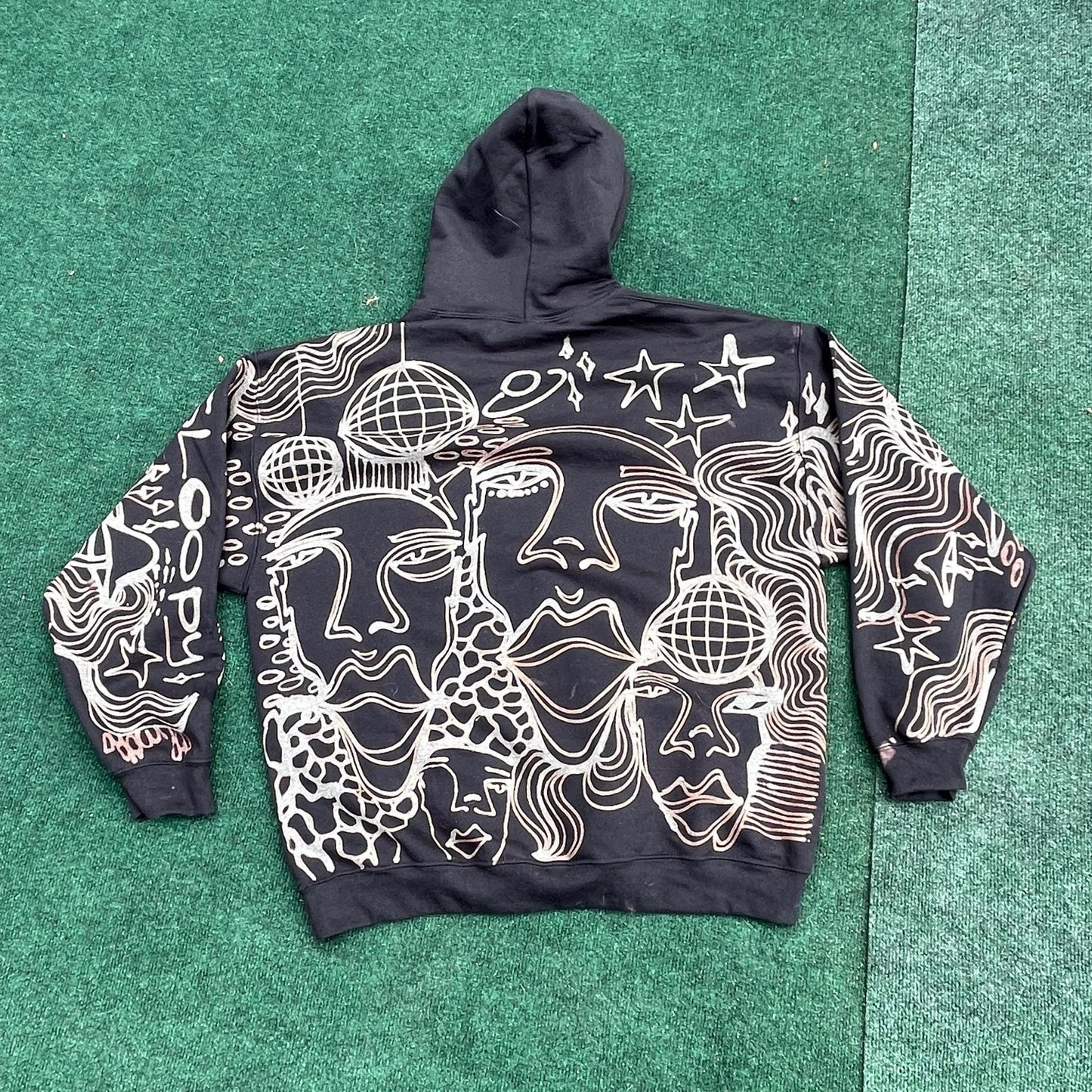 Abstract faces, disco ball, stars, and trippy patterns festival style style hoodie in brown and cream