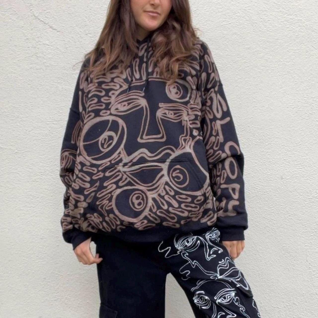Faces and 8 ball pattern hoodie