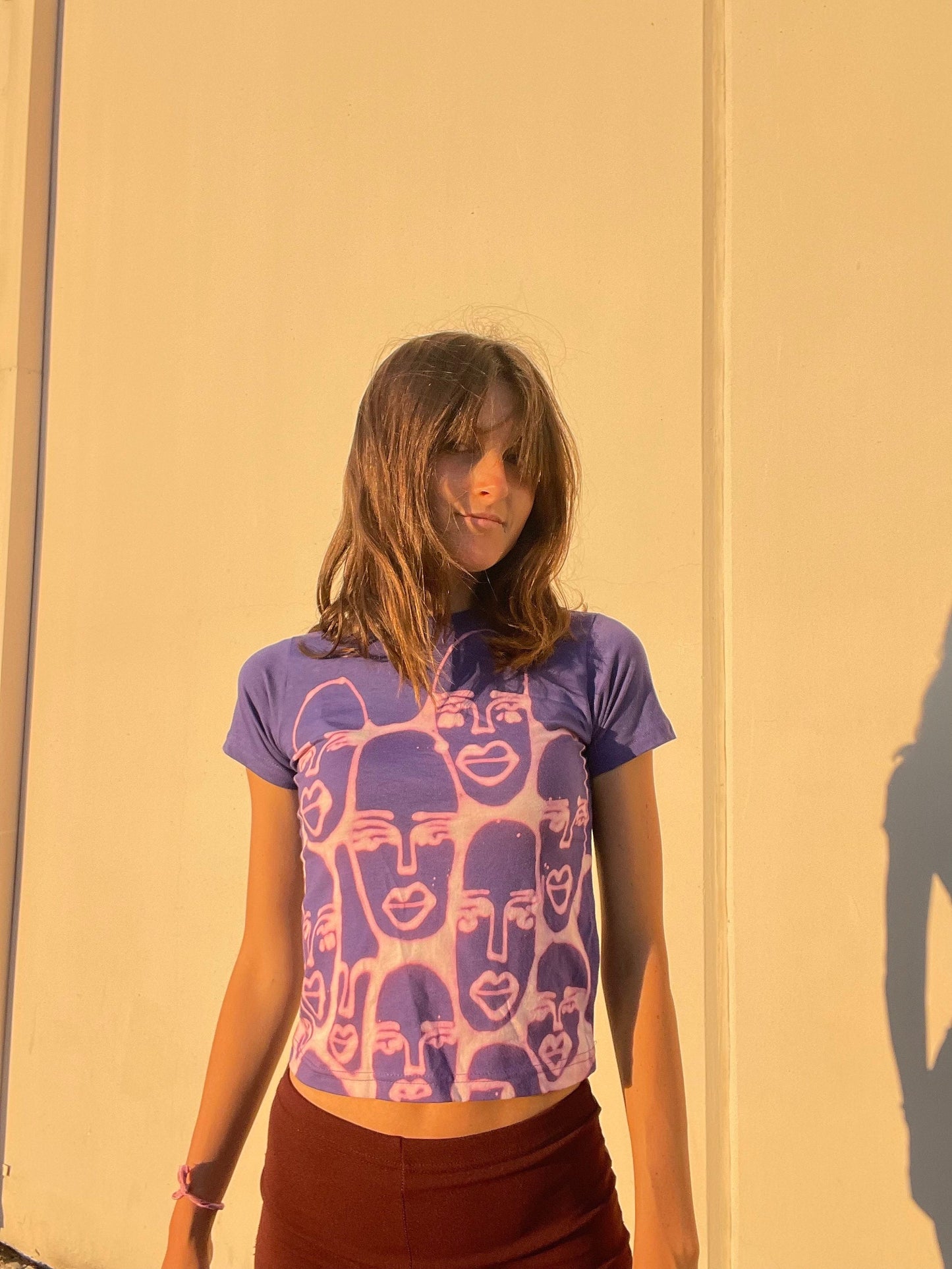 Various faces baby tees