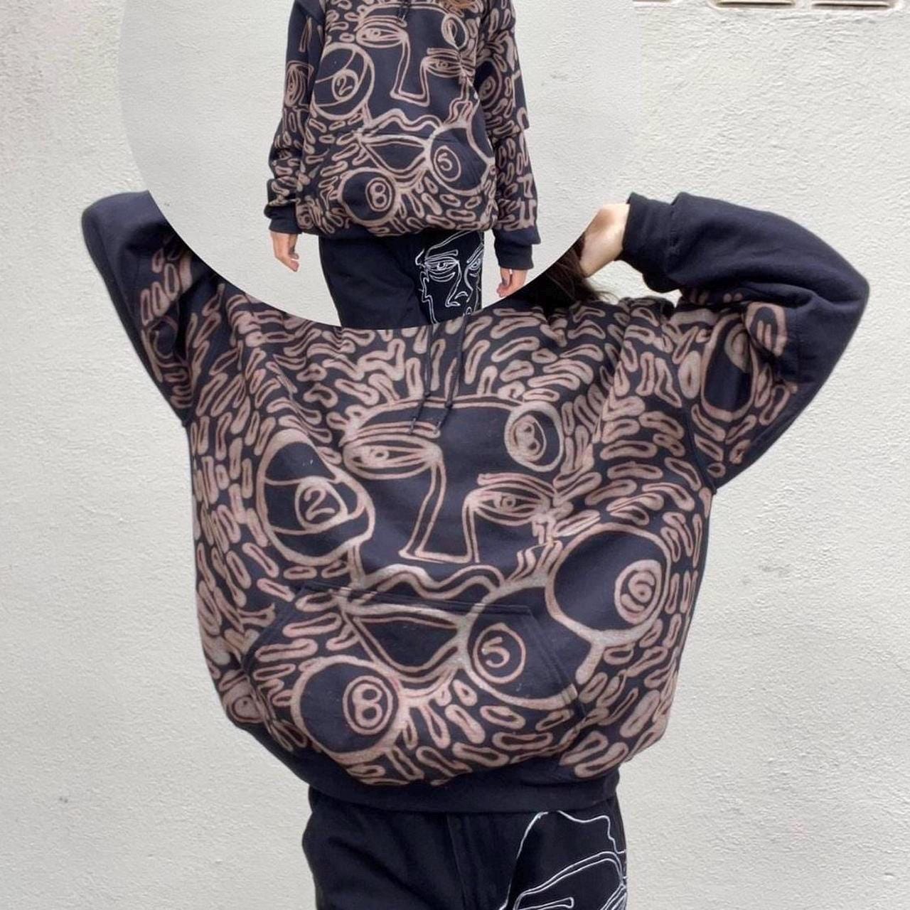 Faces and 8 ball pattern hoodie