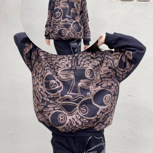 Faces and 8 ball pattern hoodie