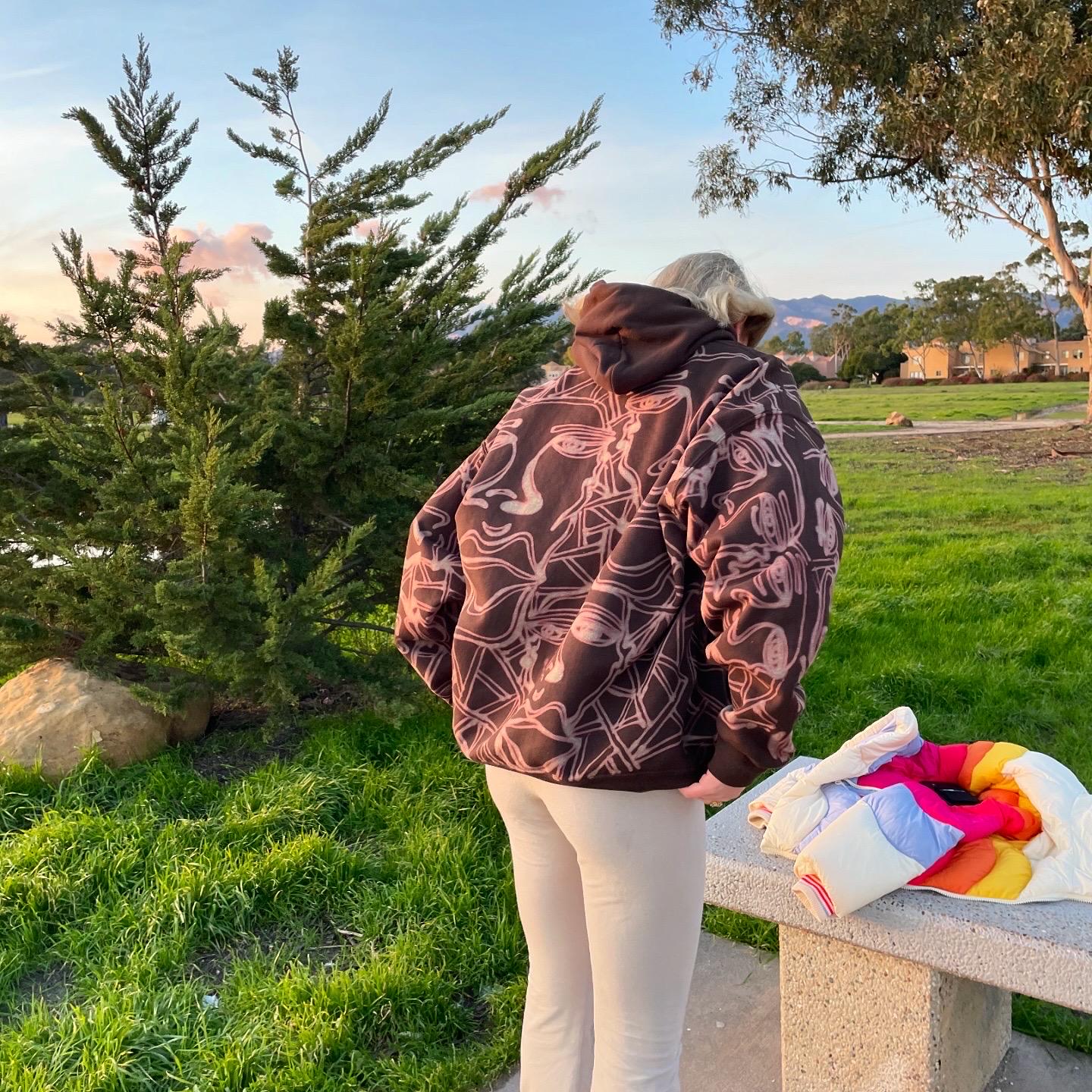 Geometric faces and fractal pattern sweatsuit