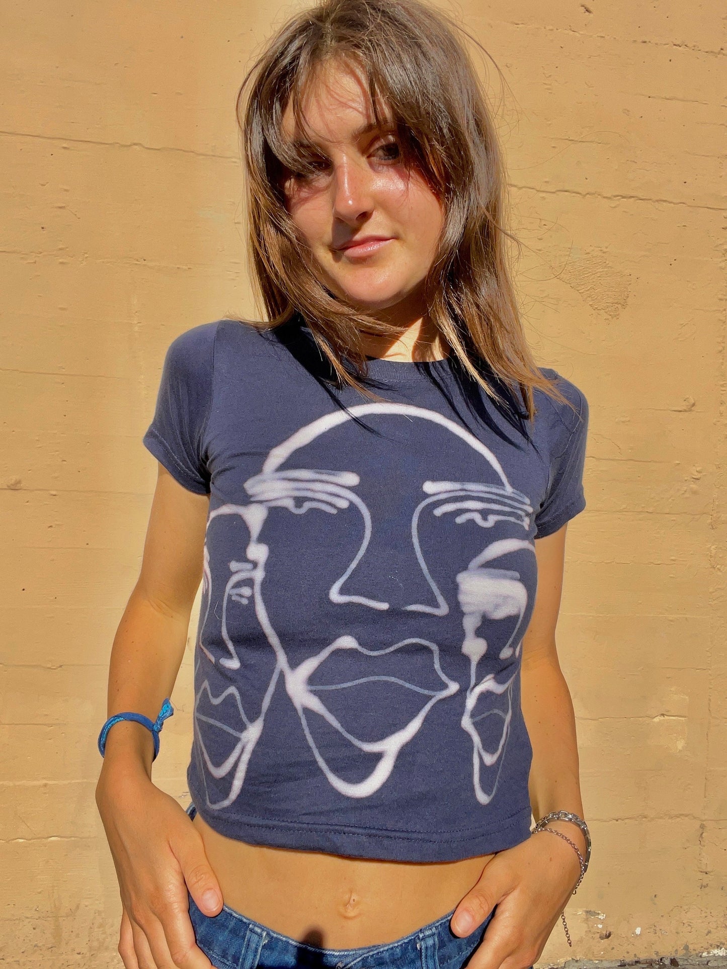 Various faces baby tees