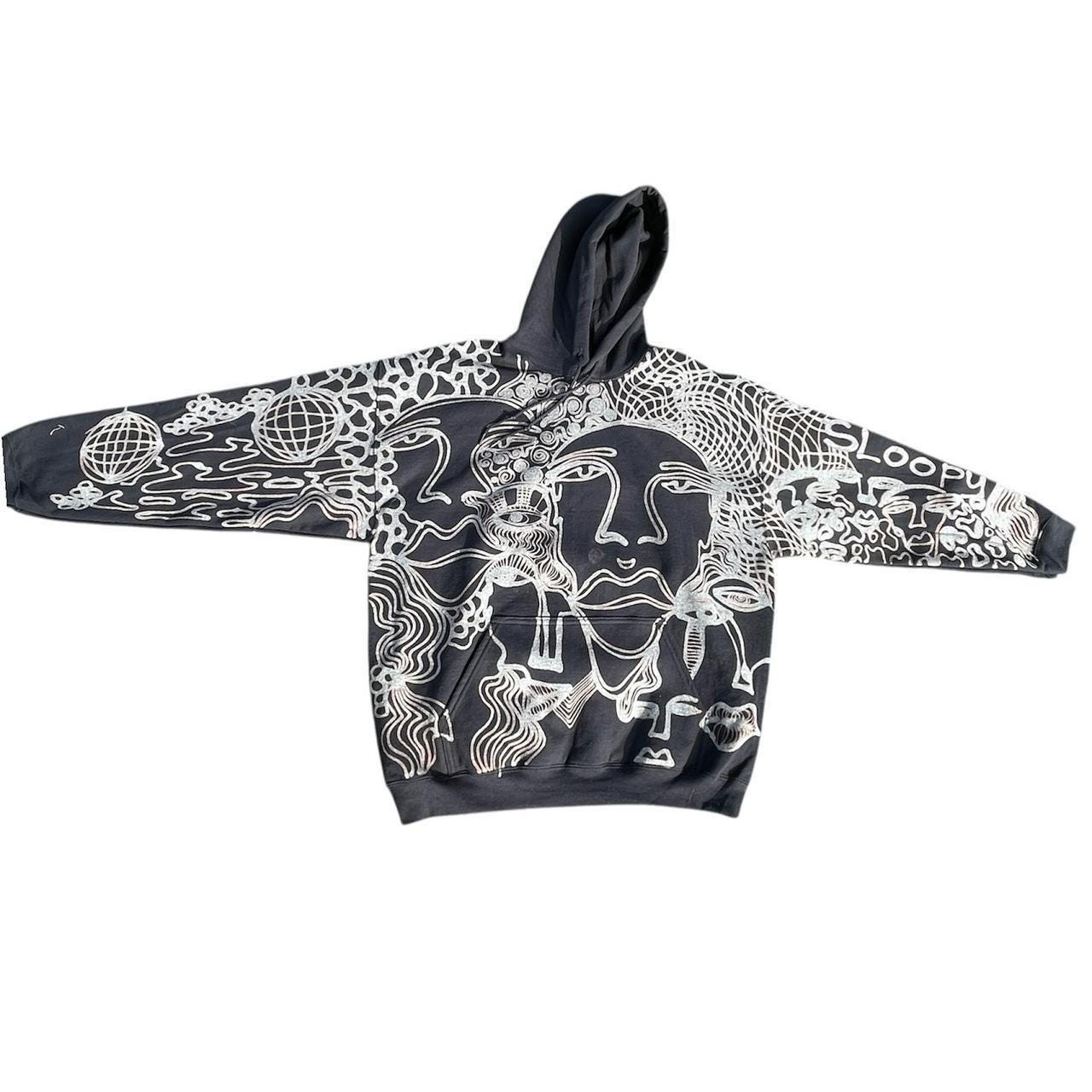 Graphic faces and trippy geometric patterned hoodie