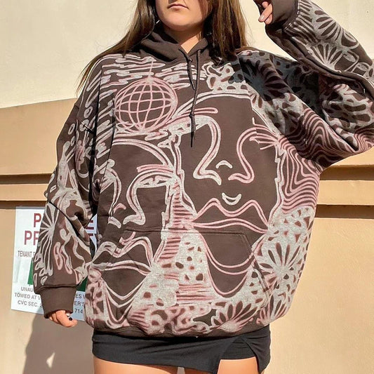 Abstract faces, floral pattern, and geometric style hoodie in dark chocolate brown and cream