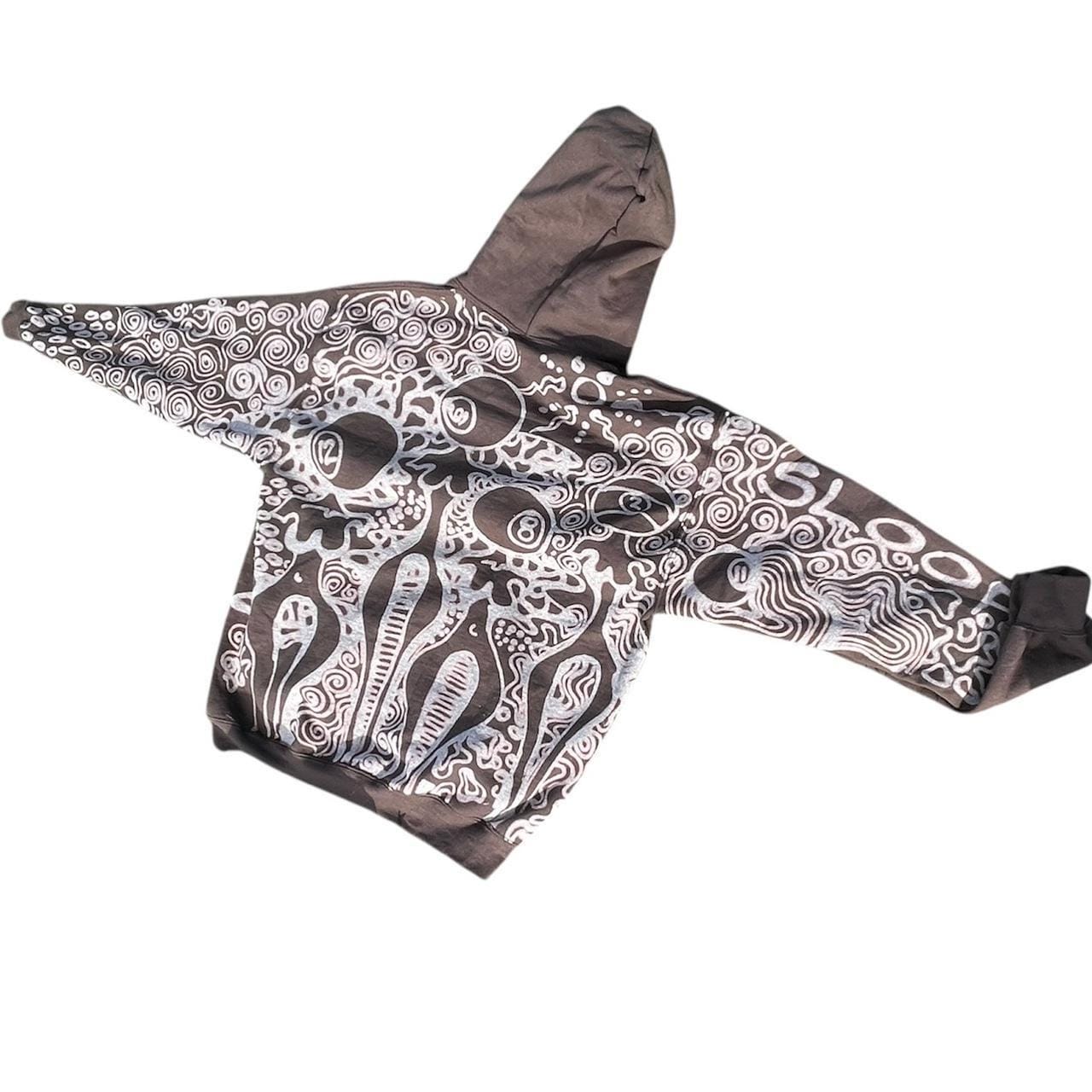 Graphic faces and trippy geometric patterned hoodie