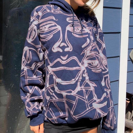 Geometric faces and fractal pattern sweatsuit