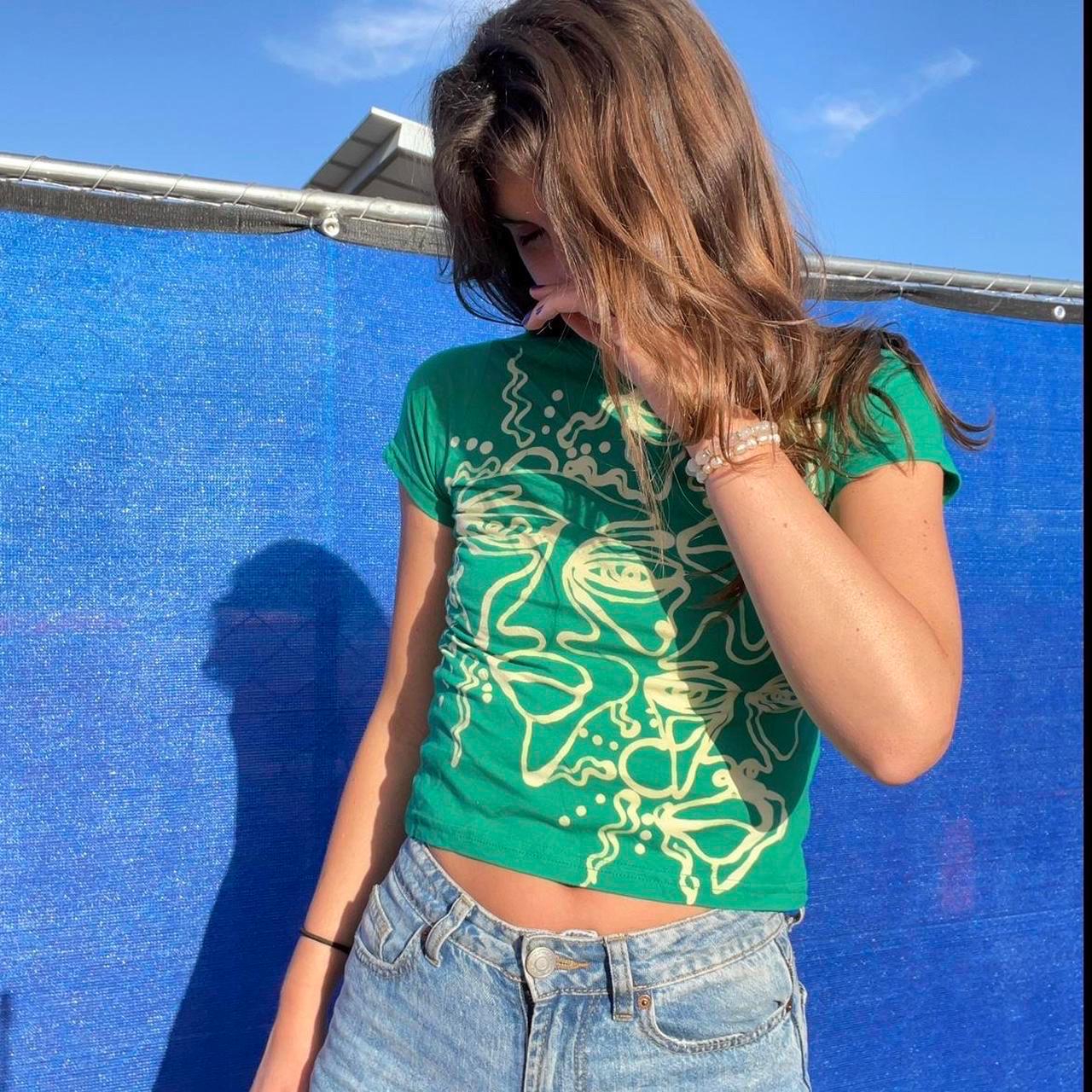 Psychedelic sun and faces patterns baby tee