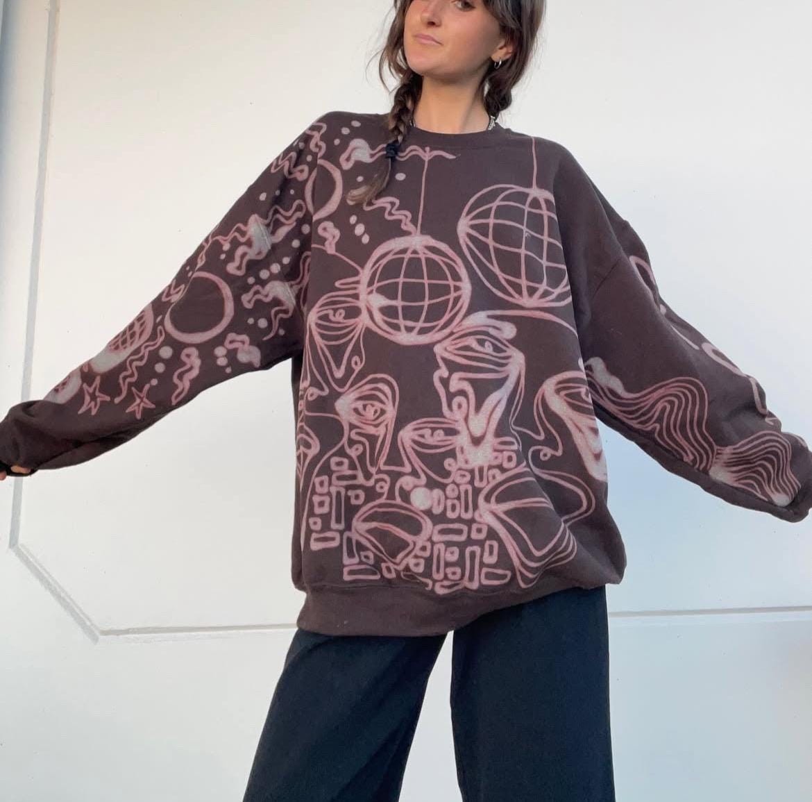 .Graphic disco and faces hoodie