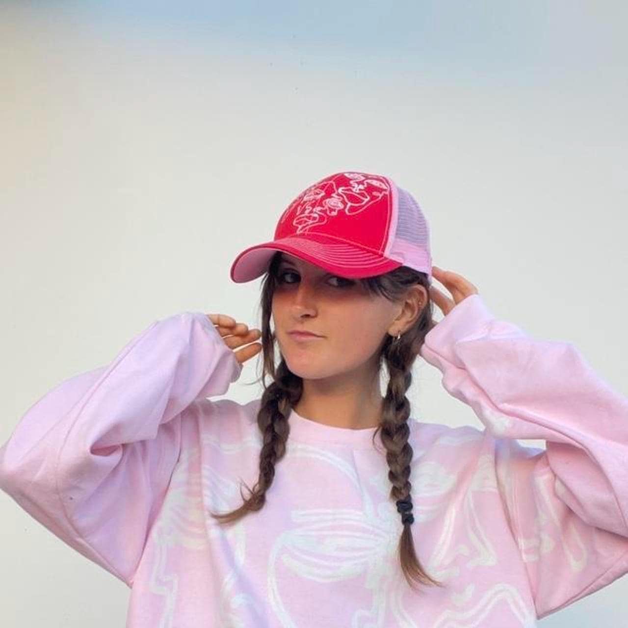 handpainted graphic faces, waves, and abstract pattern trucker festival hats