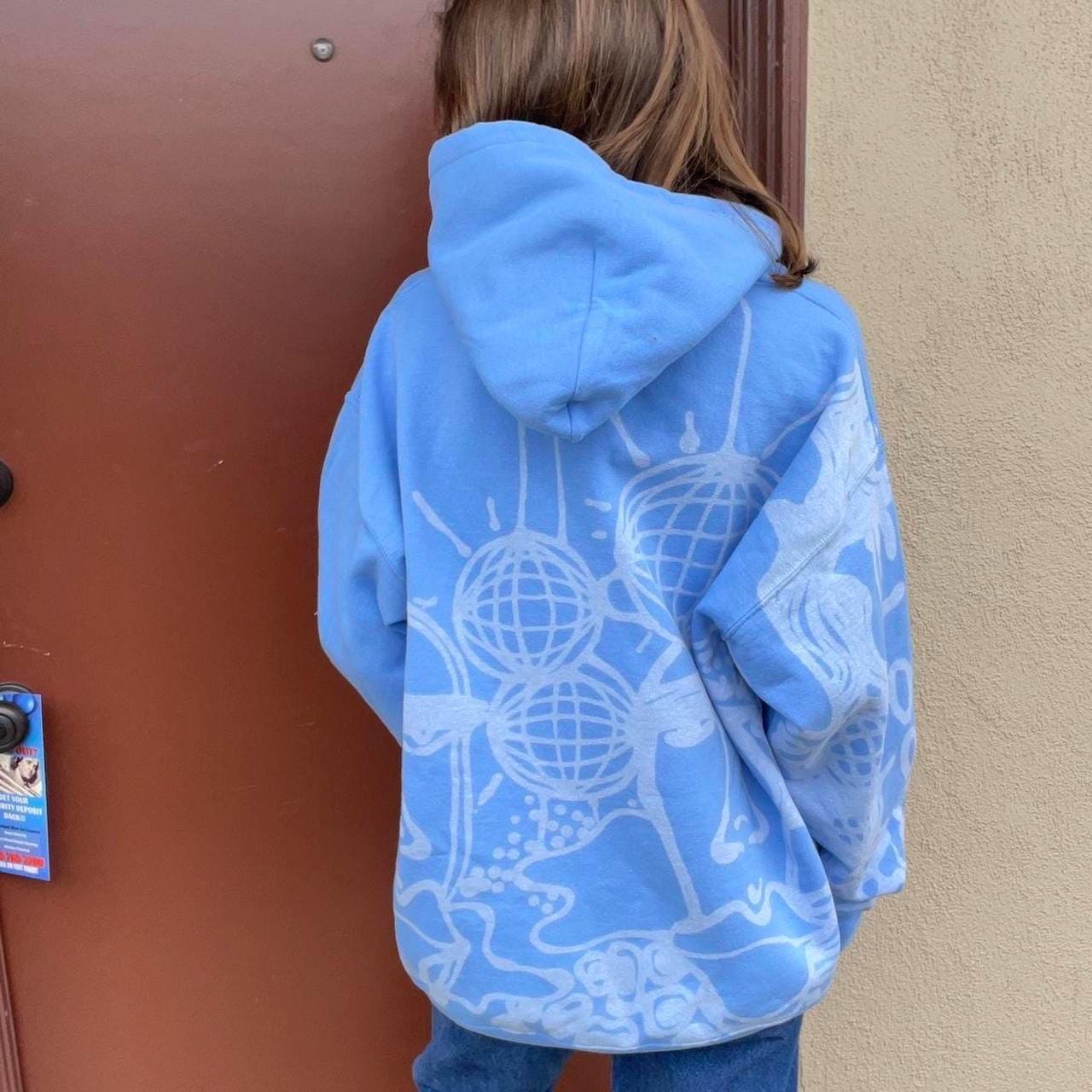 Abstract faces and unique print pastel blue hoodie