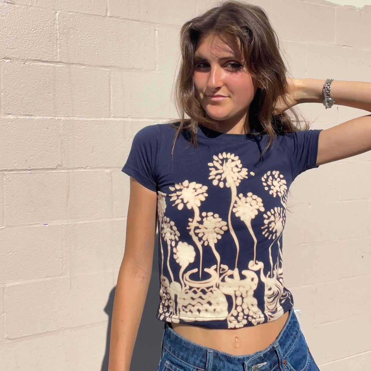 Potted daisy floral baby tee