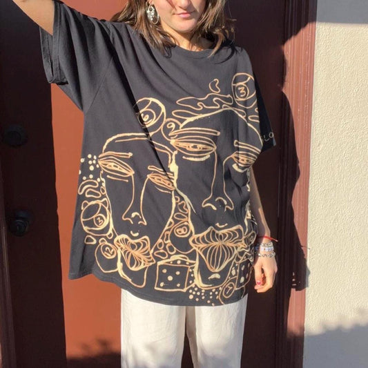 Street art faces graphic grunge tee