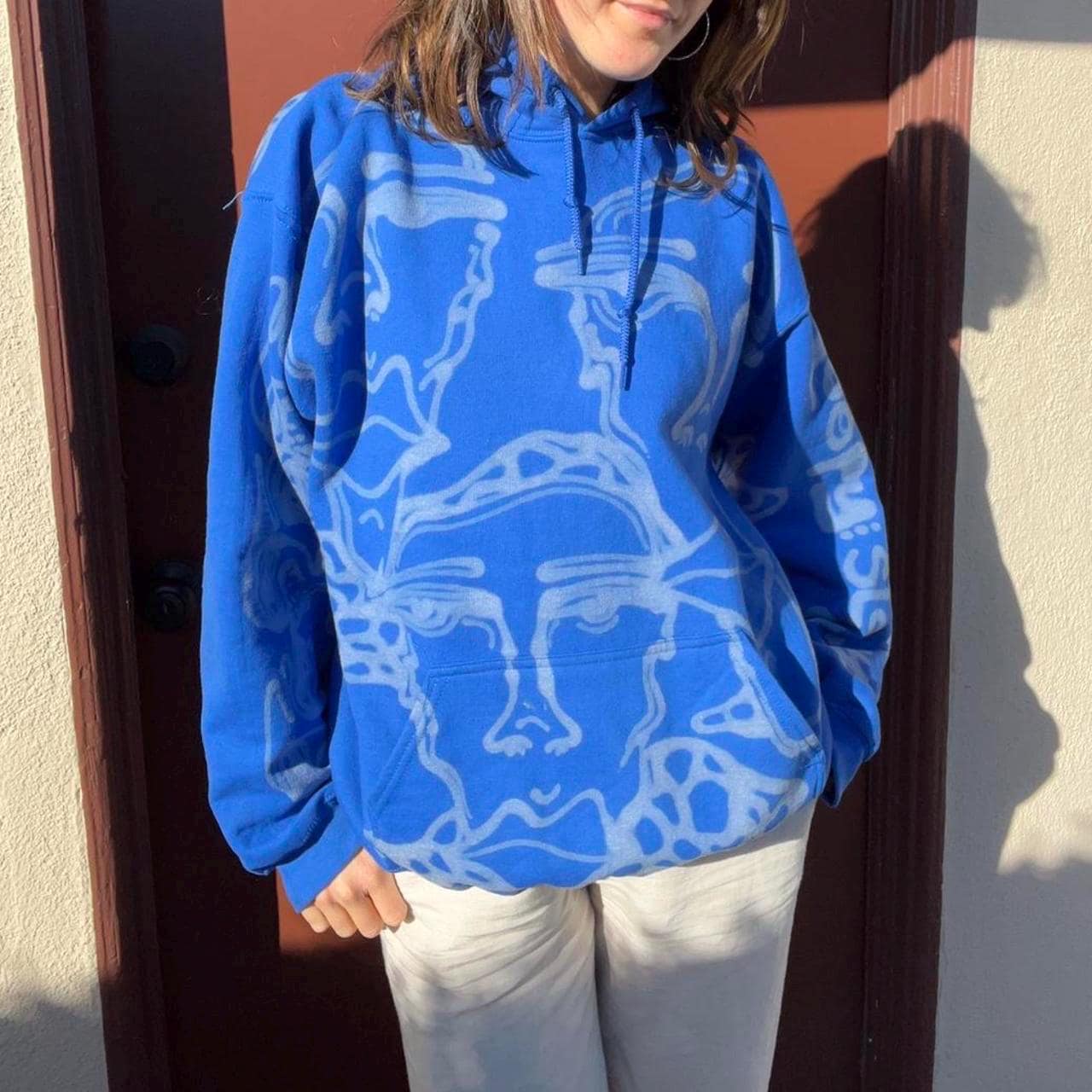 Crazy unique abstract faces oversized hoodie in royal blue