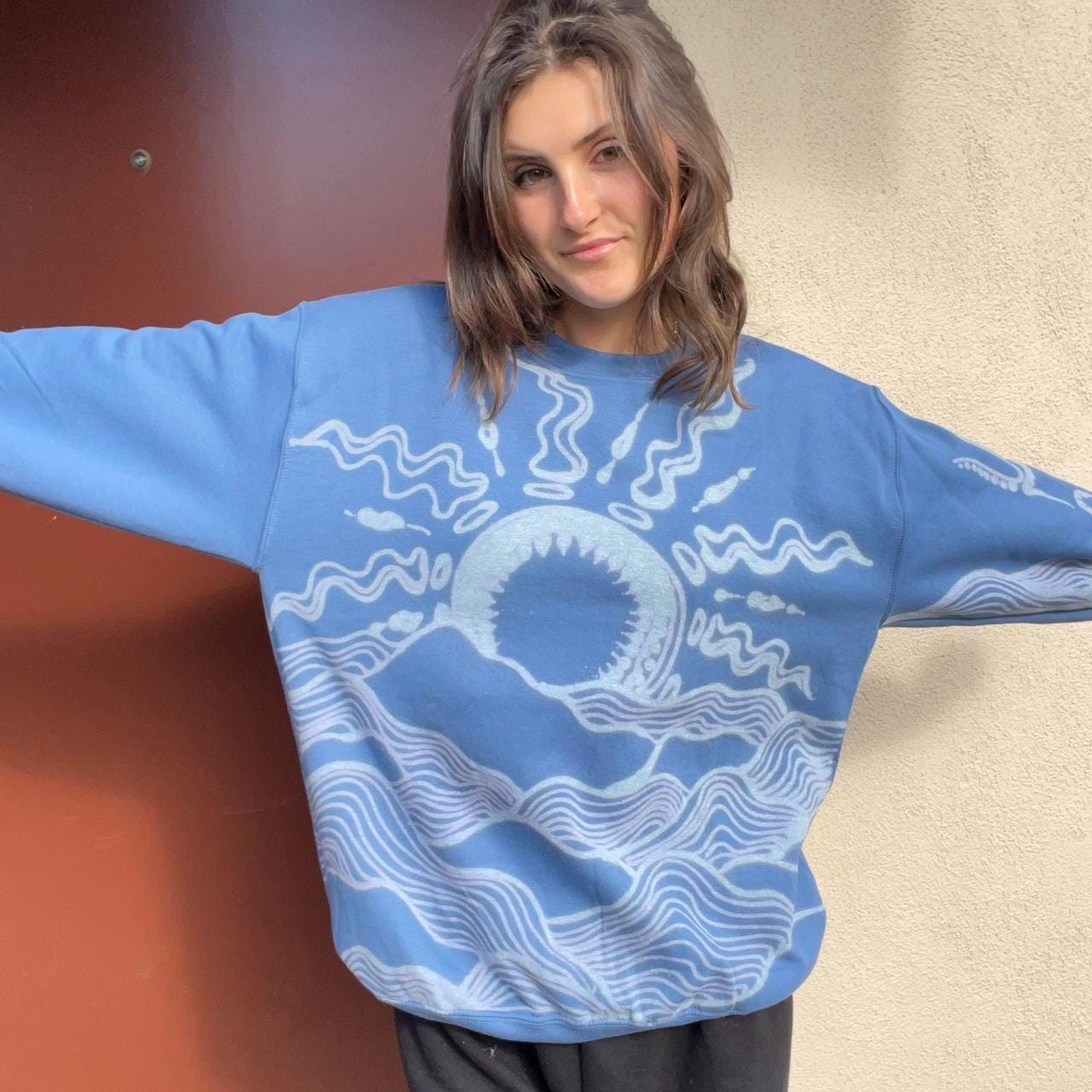 Psychedelic waves and sunset crewneck