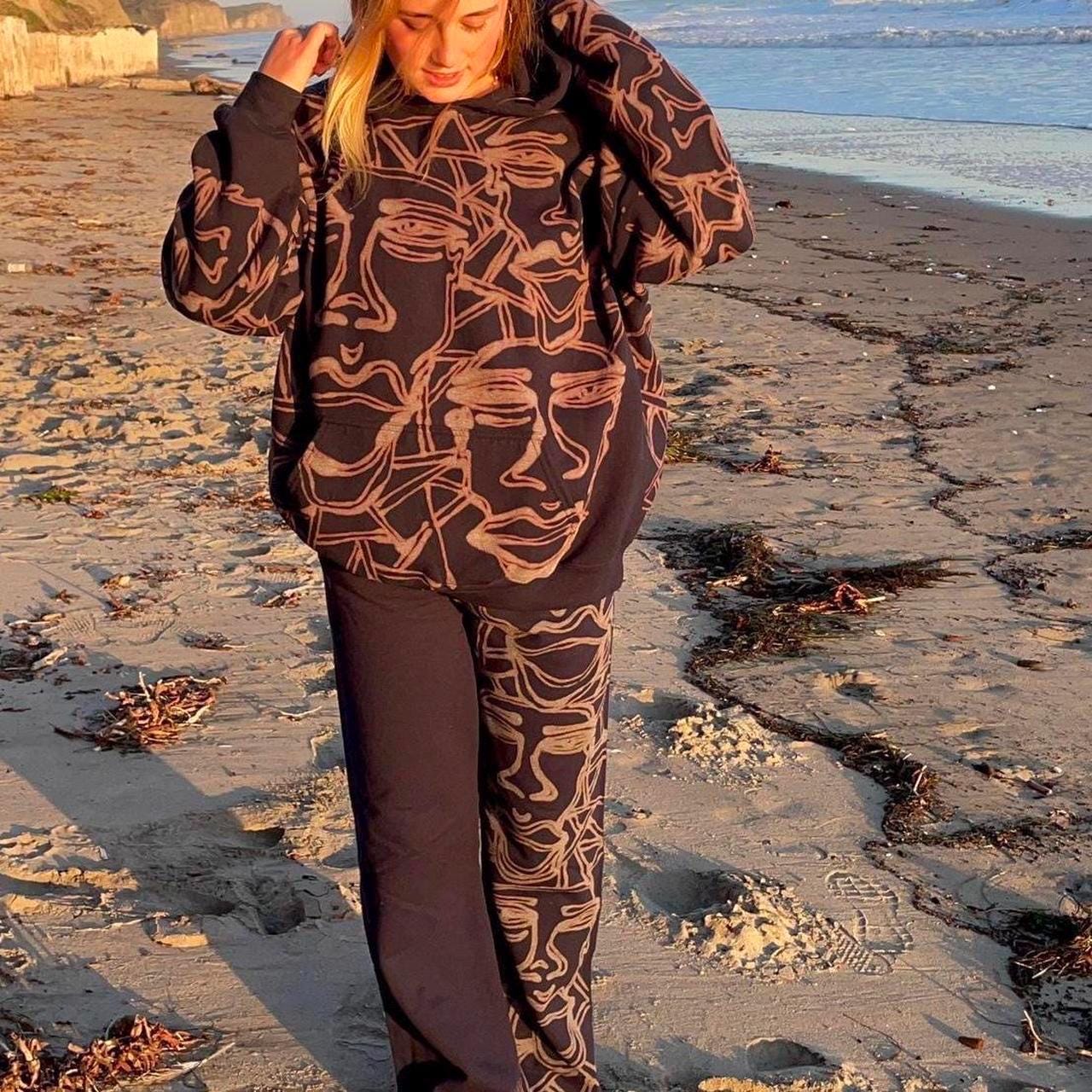 Geometric faces and fractal pattern sweatsuit