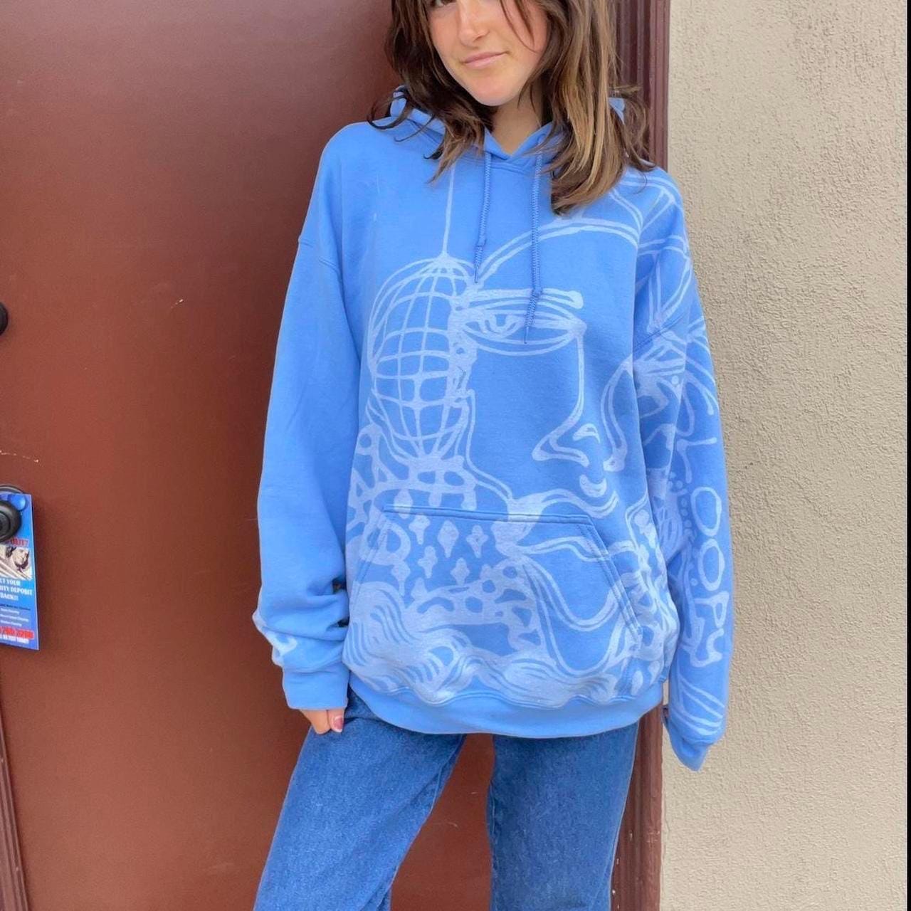 Abstract faces and unique print pastel blue hoodie