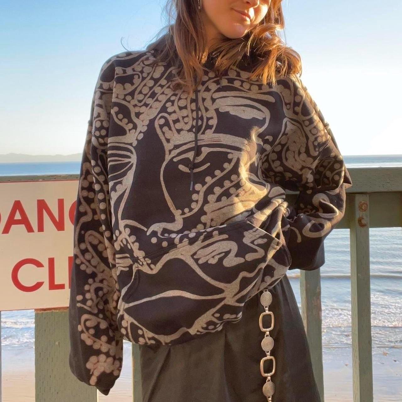 Abstract faces and geometric style spotted and striped groovy hoodie in black and grey