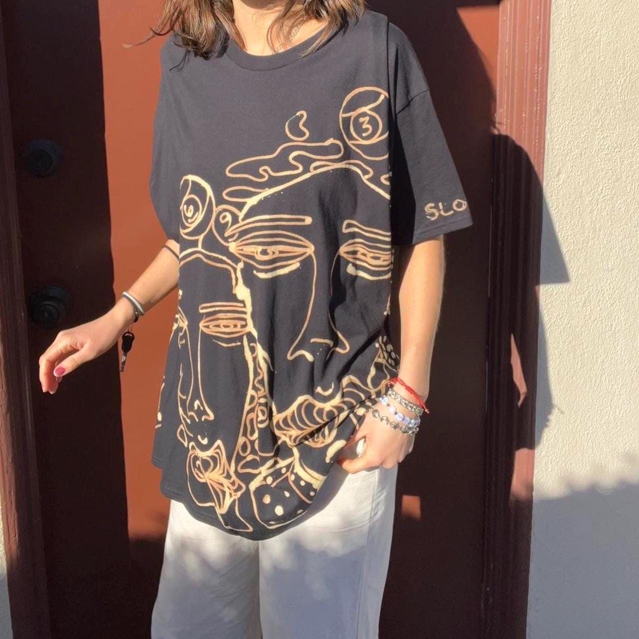Street art faces graphic grunge tee