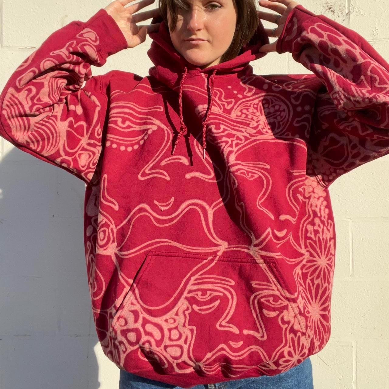 . Abstract faces, spotted mushroom clouds, and geometric cozy hoodie in dark chocolate brown and cream