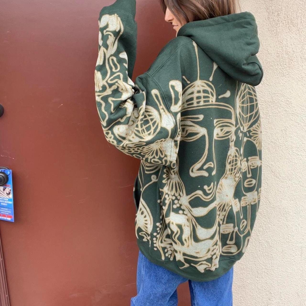 .Graphic one line disco faces hoodie