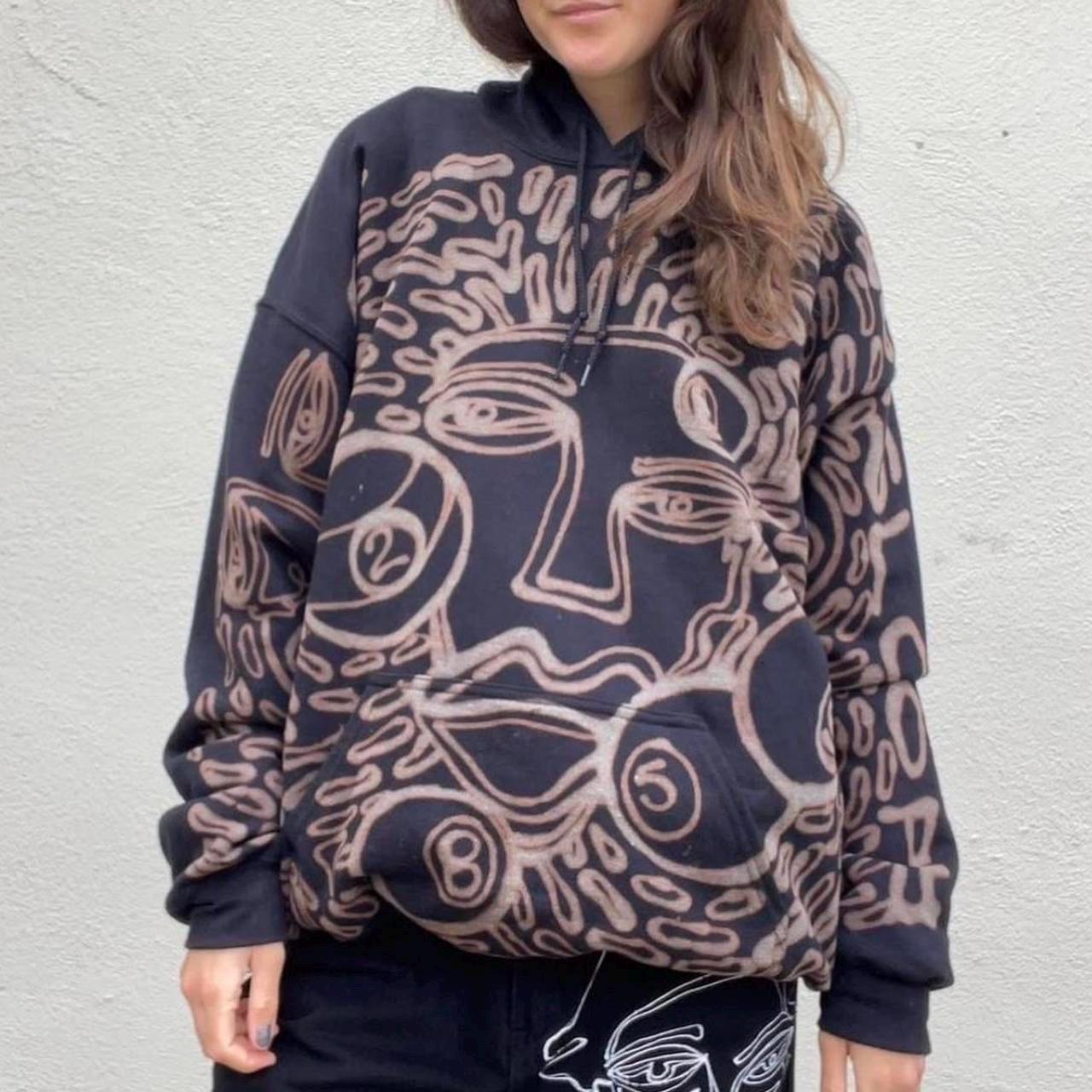 Faces and 8 ball pattern hoodie