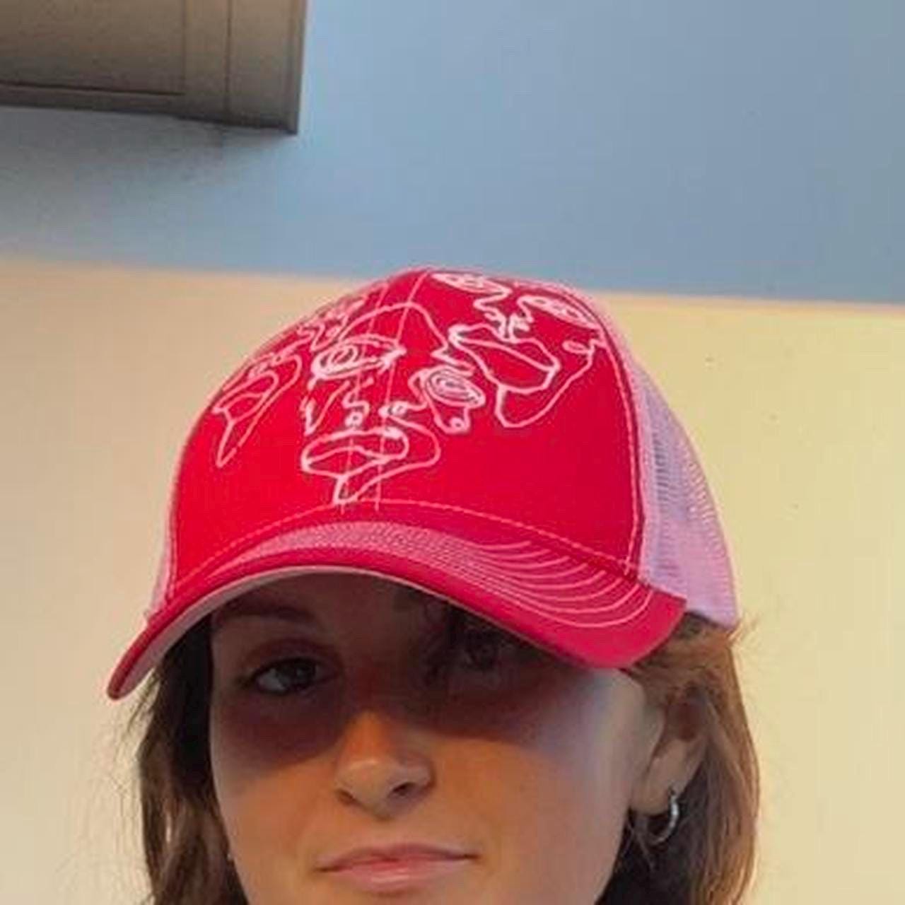 handpainted graphic faces, waves, and abstract pattern trucker festival hats