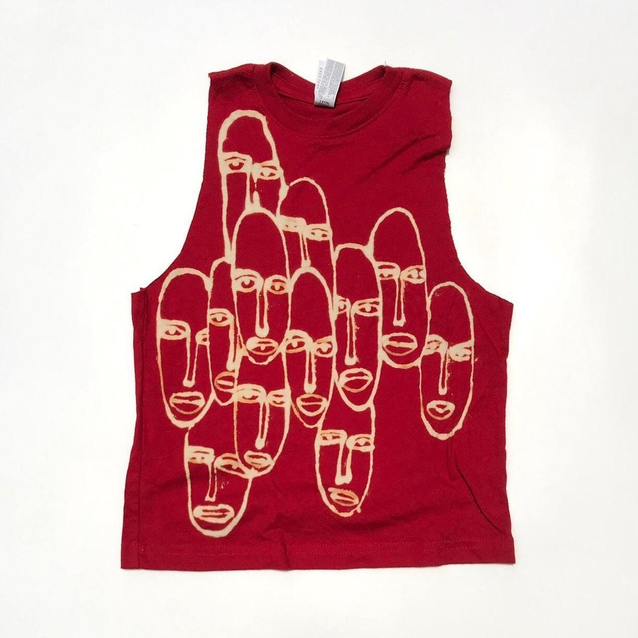 .Abstract faces halter tank