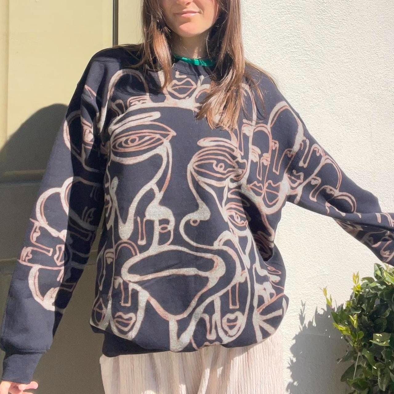 Abstract faces crewneck