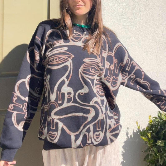 Abstract faces crewneck